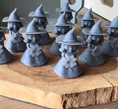 3D printed and unpainted gnome figurines.