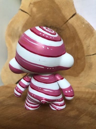 Back view of Candy cane painted Munny vinyl figure